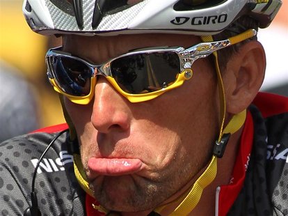 Seven-time Tour de France winner Team Radioshack rider Lance Armstrong waits at the starting line in Visalia, California of stage five of th Seven-time Tour de France winner Team Radioshack rider Lance Armstrong waits at the starting line in Visalia, California of stage five of th