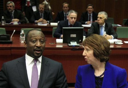 Mali's Foreign Minister Tieman Hubert Coulibaly (L) talks to EU foreign policy chief Catherine Ashton during an European Union emergency for Mali's Foreign Minister Tieman Hubert Coulibaly (L) talks to EU foreign policy chief Catherine Ashton during an European Union emergency for