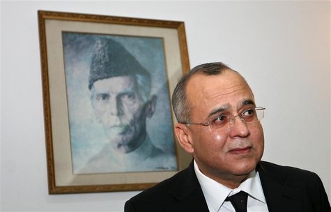 Pakistan's High Commissioner to India Salman Bashir arrives to address a news conference as a portrait of Mohammad Ali Jinnah, generally reg Pakistan's High Commissioner to India Salman Bashir arrives to address a news conference as a portrait of Mohammad Ali Jinnah, generally reg