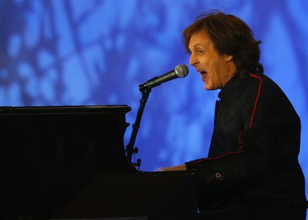 Musician Paul McCartney performs during the opening ceremony of the London 2012 Olympic Games at the Olympic Stadium July 27, 2012. REUTERS/ Musician Paul McCartney performs during the opening ceremony of the London 2012 Olympic Games at the Olympic Stadium July 27, 2012. REUTERS/