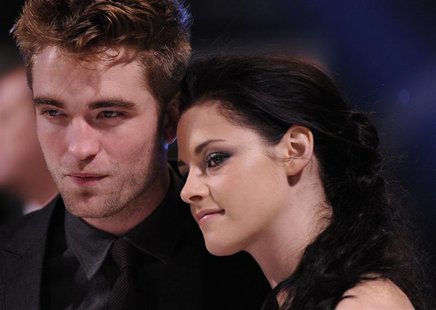 Actors Robert Pattinson (L) and Kristen Stewart arrive for the British premiere of 'The Twilight Saga: Breaking Dawn' at Westfield Stratford Actors Robert Pattinson (L) and Kristen Stewart arrive for the British premiere of 'The Twilight Saga: Breaking Dawn' at Westfield Stratford