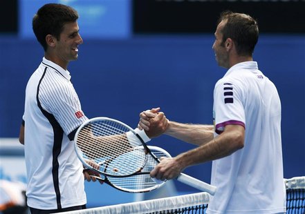 Novak Djokovic of Serbia (L) shakes hands with Radek Stepanek of Czech Republic after defeating him in their men's singles match at the Aust Novak Djokovic of Serbia (L) shakes hands with Radek Stepanek of Czech Republic after defeating him in their men's singles match at the Aust