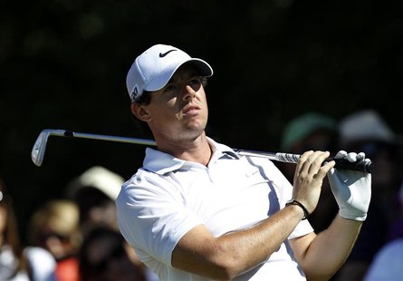 Rory McIlroy of Northern Ireland watches at the fourth hole during the second round of the Abu Dhabi Golf Championship at the Abu Dhabi Golf Rory McIlroy of Northern Ireland watches at the fourth hole during the second round of the Abu Dhabi Golf Championship at the Abu Dhabi Golf