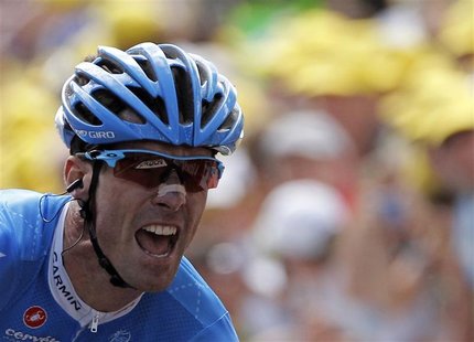 Garmin-Sharp rider David Millar of Britain reacts on the finish line as he wins the 12th stage of the 99th Tour de France cycling race betwe Garmin-Sharp rider David Millar of Britain reacts on the finish line as he wins the 12th stage of the 99th Tour de France cycling race betwe