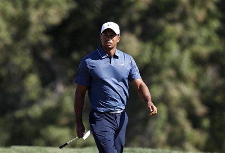 Tiger Woods of the U.S. walks at the seventh green during the second round of the Abu Dhabi Golf Championship at the Abu Dhabi Golf Club Jan Tiger Woods of the U.S. walks at the seventh green during the second round of the Abu Dhabi Golf Championship at the Abu Dhabi Golf Club Jan