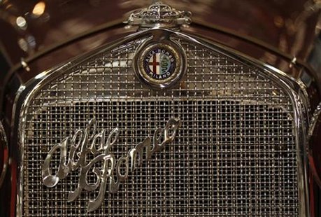 The emblem of an Alfa Romeo is pictured during a press presentation prior to the Essen Motor Show in Essen November 30, 2012. REUTERS/Ina Fa The emblem of an Alfa Romeo is pictured during a press presentation prior to the Essen Motor Show in Essen November 30, 2012. REUTERS/Ina Fa