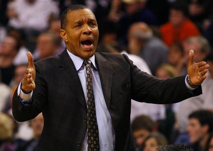 Phoenix Suns head coach Alvin Gentry directs his team against the Boston Celtics in the second quarter of their NBA basketball game in Bosto Phoenix Suns head coach Alvin Gentry directs his team against the Boston Celtics in the second quarter of their NBA basketball game in Bosto