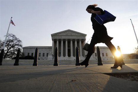 A pedestrian walks past the US Supreme Court building in Washington, December 8, 2009. REUTERS/Jonathan Ernst A pedestrian walks past the US Supreme Court building in Washington, December 8, 2009. REUTERS/Jonathan Ernst