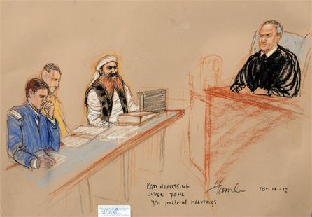 Khalid Sheikh Mohammed, (2nd R) the alleged mastermind of the September 11 attacks, addresses the judge during the third day of pre-trial he Khalid Sheikh Mohammed, (2nd R) the alleged mastermind of the September 11 attacks, addresses the judge during the third day of pre-trial he