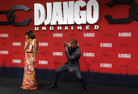 Cast members Kerry Washington (L) and Jamie Foxx pose on the red carpet for the German premiere of "Django Unchained" in Berlin January 8, 2 Cast members Kerry Washington (L) and Jamie Foxx pose on the red carpet for the German premiere of "Django Unchained" in Berlin January 8, 2