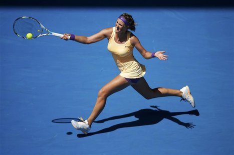 Victoria Azarenka of Belarus hits a return to Jamie Hampton of the U.S. during their women's singles match at the Australian Open tennis tou Victoria Azarenka of Belarus hits a return to Jamie Hampton of the U.S. during their women's singles match at the Australian Open tennis tou