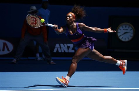Serena Williams of the U.S. hits a return to Ayumi Morita of Japan during their women's singles match at the Australian Open tennis tourname Serena Williams of the U.S. hits a return to Ayumi Morita of Japan during their women's singles match at the Australian Open tennis tourname