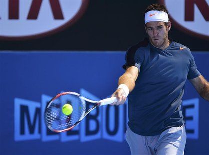 Juan Martin del Potro of Argentina hits a return to Jeremy Chardy of France during their men's singles match at the Australian Open tennis t Juan Martin del Potro of Argentina hits a return to Jeremy Chardy of France during their men's singles match at the Australian Open tennis t