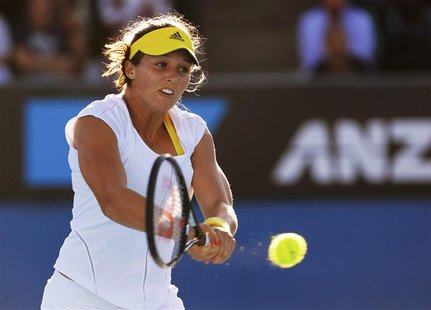 Laura Robson of Britain hits a return to Sloane Stephens of the U.S. during their women's singles match at the Australian Open tennis tourna Laura Robson of Britain hits a return to Sloane Stephens of the U.S. during their women's singles match at the Australian Open tennis tourna