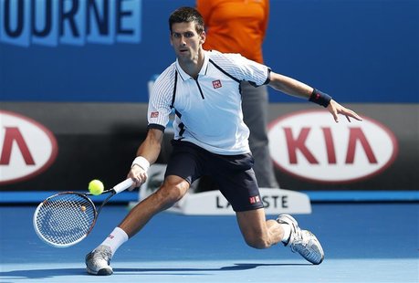 Novak Djokovic of Serbia hits a return to Radek Stepanek of Czech Republic during their men's singles match at the Australian Open tennis to Novak Djokovic of Serbia hits a return to Radek Stepanek of Czech Republic during their men's singles match at the Australian Open tennis to