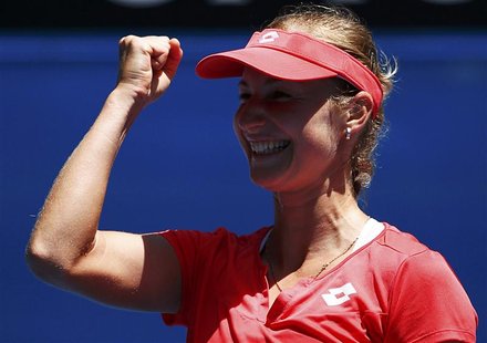 Ekaterina Makarova of Russia celebrates defeating Angelique Kerber of Germany in their women's singles match at the Australian Open tennis t Ekaterina Makarova of Russia celebrates defeating Angelique Kerber of Germany in their women's singles match at the Australian Open tennis t