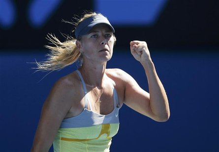 Maria Sharapova of Russia celebrates defeating Kirsten Flipkens of Belgium in their women's singles match at the Australian Open tennis tour Maria Sharapova of Russia celebrates defeating Kirsten Flipkens of Belgium in their women's singles match at the Australian Open tennis tour