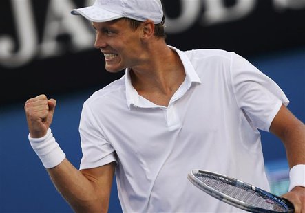 Tomas Berdych of Czech Republic celebrates defeating Kevin Anderson of South Africa in their men's singles match at the Australian Open tenn Tomas Berdych of Czech Republic celebrates defeating Kevin Anderson of South Africa in their men's singles match at the Australian Open tenn