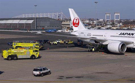 Fire trucks surround a Japan Airlines Boeing 787 Dreamliner that caught fire at Logan International Airport in Boston, Massachusetts January Fire trucks surround a Japan Airlines Boeing 787 Dreamliner that caught fire at Logan International Airport in Boston, Massachusetts January