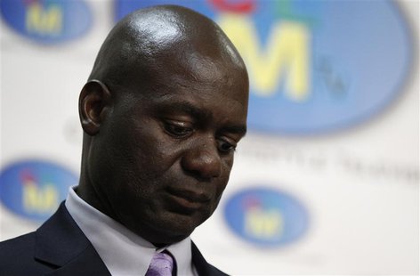 Former Canadian sprinter Ben Johnson listens to a question during a news conference held before a sports symposium in New York May 27, 2010. Former Canadian sprinter Ben Johnson listens to a question during a news conference held before a sports symposium in New York May 27, 2010.
