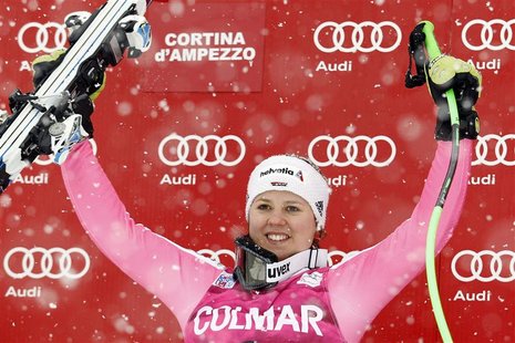 Viktoria Rebensburg of Germany celebrates on the podium after winning the women's Super G event at the Alpine Skiing World Cup in Cortina d' Viktoria Rebensburg of Germany celebrates on the podium after winning the women's Super G event at the Alpine Skiing World Cup in Cortina d'