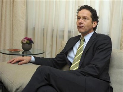 Netherlands' Finance Minister Jeroen Dijsselbloem takes a seat during his meeting with Luxembourg's Prime Minister and Eurogroup Chairman Je Netherlands' Finance Minister Jeroen Dijsselbloem takes a seat during his meeting with Luxembourg's Prime Minister and Eurogroup Chairman Je