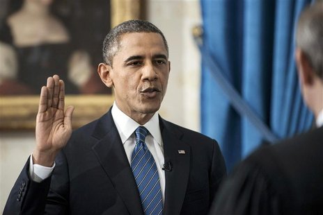 U.S. President Barack Obama takes the official oath of office from U.S. Supreme Court Chief Justice John Roberts, as Obama is sworn in for h U.S. President Barack Obama takes the official oath of office from U.S. Supreme Court Chief Justice John Roberts, as Obama is sworn in for h