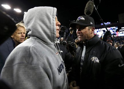 New England Patriots head coach Bill Belichick (L) congradulates Baltimore Ravens head coach John Harbaugh after the Ravens defeated the Pat New England Patriots head coach Bill Belichick (L) congradulates Baltimore Ravens head coach John Harbaugh after the Ravens defeated the Pat