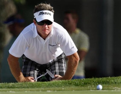 Brian Gay of the U.S. lines up his shot at the edge of the seventeenth green during the final round of the St. Jude Classic golf tournament Brian Gay of the U.S. lines up his shot at the edge of the seventeenth green during the final round of the St. Jude Classic golf tournament