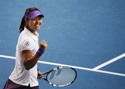 Li Na of China celebrates defeating Julia Goerges of Germany in their women's singles match against at the Australian Open tennis tournament Li Na of China celebrates defeating Julia Goerges of Germany in their women's singles match against at the Australian Open tennis tournament