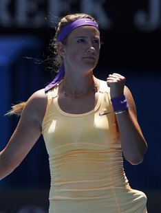 Victoria Azarenka of Belarus celebrates defeating Elena Vesnina of Russia in their women's singles match at the Australian Open tennis tourn Victoria Azarenka of Belarus celebrates defeating Elena Vesnina of Russia in their women's singles match at the Australian Open tennis tourn