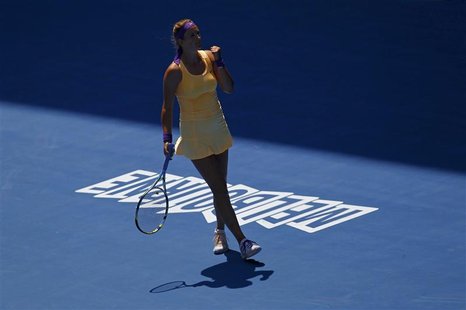 Victoria Azarenka of Belarus celebrates defeating Elena Vesnina of Russia in their women's singles match at the Australian Open tennis tourn Victoria Azarenka of Belarus celebrates defeating Elena Vesnina of Russia in their women's singles match at the Australian Open tennis tourn