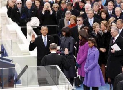 Barack Obama takes the oath of office to begin his second term (Reuters) Barack Obama takes the oath of office to begin his second term (Reuters)