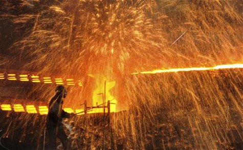 A labourer works at a steel factory in Dalian, Liaoning province December 4, 2012. REUTERS/China Daily A labourer works at a steel factory in Dalian, Liaoning province December 4, 2012. REUTERS/China Daily