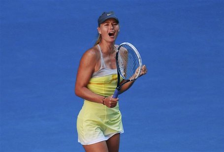 Maria Sharapova of Russia celebrates defeating compatriot Ekaterina Makarova in their women's singles quarter-final match at the Australian Maria Sharapova of Russia celebrates defeating compatriot Ekaterina Makarova in their women's singles quarter-final match at the Australian