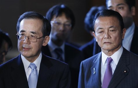 Bank of Japan Governor Masaaki Shirakawa (L) and Finance Minister Taro Aso attend a joint news conference with Economics Minister Akira Amar Bank of Japan Governor Masaaki Shirakawa (L) and Finance Minister Taro Aso attend a joint news conference with Economics Minister Akira Amar