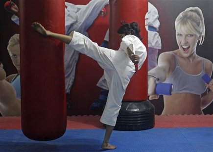 Sweety, 22, a student, takes a self defence class in New Delhi, January 14, 2013. Sweety travels four hours every day from her village to th Sweety, 22, a student, takes a self defence class in New Delhi, January 14, 2013. Sweety travels four hours every day from her village to th