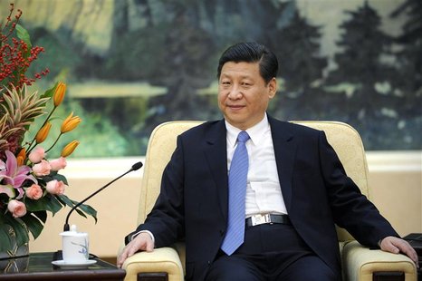 China's Communist Party chief Xi Jinping looks on during his meeting with U.N. General Assembly President Vuk Jeremic at the Great Hall of t China's Communist Party chief Xi Jinping looks on during his meeting with U.N. General Assembly President Vuk Jeremic at the Great Hall of t