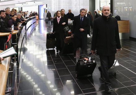 Herman Nackaerts, head of a delegation of the International Atomic Energy Agency (IAEA), pulls his suitcases at the airport in Vienna after Herman Nackaerts, head of a delegation of the International Atomic Energy Agency (IAEA), pulls his suitcases at the airport in Vienna after