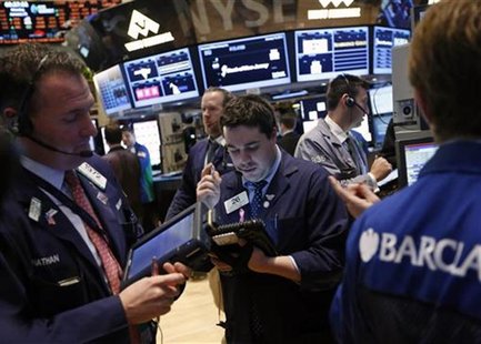 Traders work on the floor of the New York Stock Exchange, January 14, 2013. REUTERS/Brendan McDermid Traders work on the floor of the New York Stock Exchange, January 14, 2013. REUTERS/Brendan McDermid