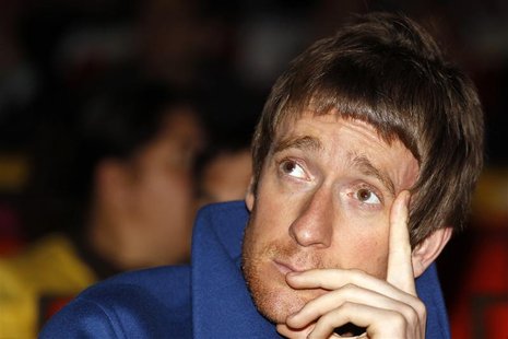 Britain's cyclist Bradley Wiggins attends the presentation of the itinerary of the 2013 Tour de France cycling race in Paris October 24, 201 Britain's cyclist Bradley Wiggins attends the presentation of the itinerary of the 2013 Tour de France cycling race in Paris October 24, 201
