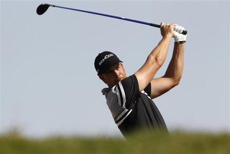Henrik Stenson of Sweden tees off at the third hole during the first round of the Abu Dhabi Golf Championship at the Abu Dhabi Golf Club Jan Henrik Stenson of Sweden tees off at the third hole during the first round of the Abu Dhabi Golf Championship at the Abu Dhabi Golf Club Jan