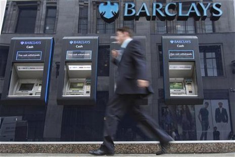 A man passes automated teller machines at a Barclays bank branch in London August 30, 2012. REUTERS/Neil Hall A man passes automated teller machines at a Barclays bank branch in London August 30, 2012. REUTERS/Neil Hall