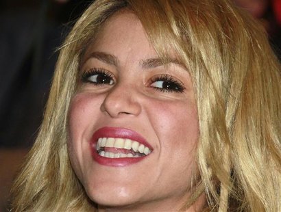 Colombian singer Shakira smiles before being awarded Knight of Arts and Letter by French Culture Minister Frederic Mitterrand (not pictured) Colombian singer Shakira smiles before being awarded Knight of Arts and Letter by French Culture Minister Frederic Mitterrand (not pictured)