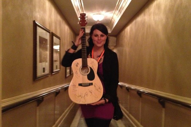 Jess Kelley holding the guitar she won for the St Jude radiothon March 7 & 8. Good Luck. This might be yours.