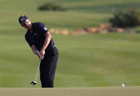 Luke Donald of England hits onto the 18th green during the fourth and final round of the DP World Tour Championship at Jumeirah Golf Estates Luke Donald of England hits onto the 18th green during the fourth and final round of the DP World Tour Championship at Jumeirah Golf Estates