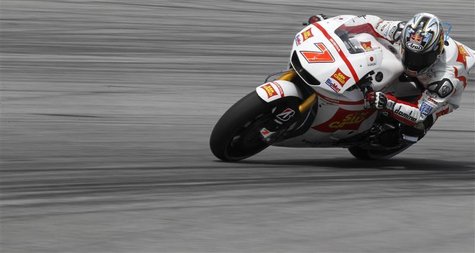 Honda MotoGP rider Hiroshi Aoyama of Japan takes a corner during the third free practice session at the Malaysian Grand Prix at Sepang Inter Honda MotoGP rider Hiroshi Aoyama of Japan takes a corner during the third free practice session at the Malaysian Grand Prix at Sepang Inter