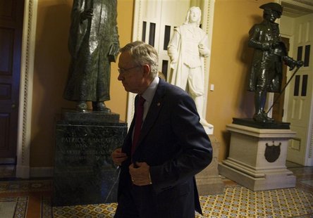 U.S. Senate Majority Leader Harry Reid (D-NV) walks to his office at the U.S. Capitol after returning from a meeting with President Barack O U.S. Senate Majority Leader Harry Reid (D-NV) walks to his office at the U.S. Capitol after returning from a meeting with President Barack O