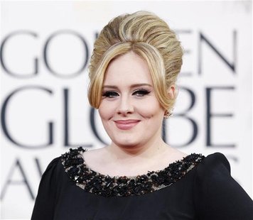 Singer Adele arrives at the 70th annual Golden Globe Awards in Beverly Hills, California January 13, 2013. REUTERS/Mario Anzuoni Singer Adele arrives at the 70th annual Golden Globe Awards in Beverly Hills, California January 13, 2013. REUTERS/Mario Anzuoni