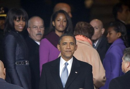 U.S. President Barack Obama turns to look at the crowds gathered on the National Mall as he leaves the podium after his swearing-in ceremoni U.S. President Barack Obama turns to look at the crowds gathered on the National Mall as he leaves the podium after his swearing-in ceremoni